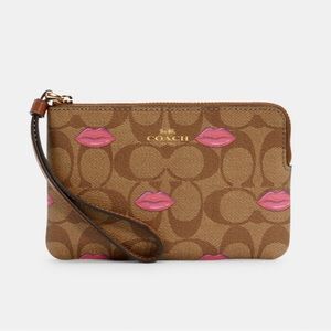 Corner Zip Wristlet With Lips Print brown and pink
